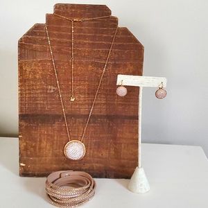 Swarovski Fun necklace and earrings and slake bracelet.  In rosegold tone.